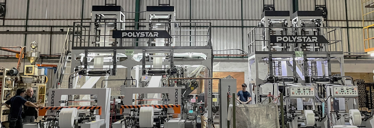 POLYSTAR machines in operation at Massive Industries, showcasing advanced technology for sustainable packaging solutions - banner